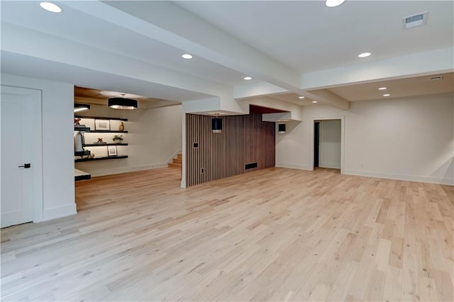 2207 W 71st St, Prairie Village, KS 66208 - finished basement with light wood finished floors, baseboards, stairs, and recessed lighting