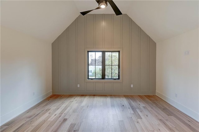 2207 W 71st St, Prairie Village, KS 66208 - bonus room with a decorative wall, light wood-style flooring, lofted ceiling, a ceiling fan, and baseboards
