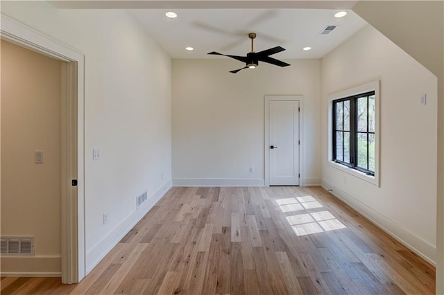2207 W 71st St, Prairie Village, KS 66208 - empty room featuring light wood-type flooring, ceiling fan, baseboards, and recessed lighting