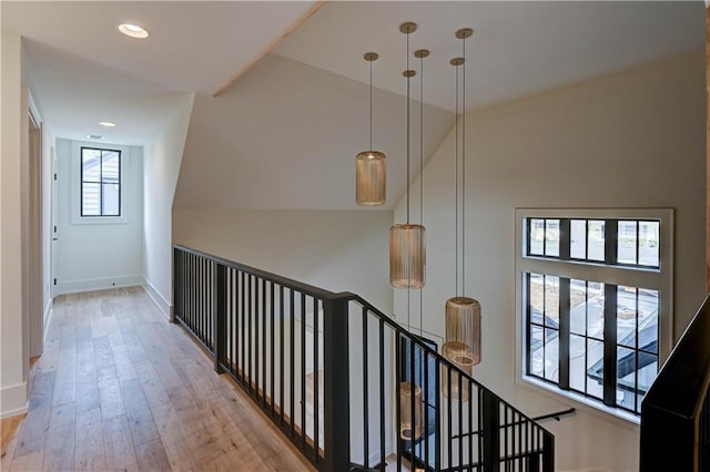2207 W 71st St, Prairie Village, KS 66208 - hallway with an upstairs landing, wood finished floors, baseboards, and recessed lighting