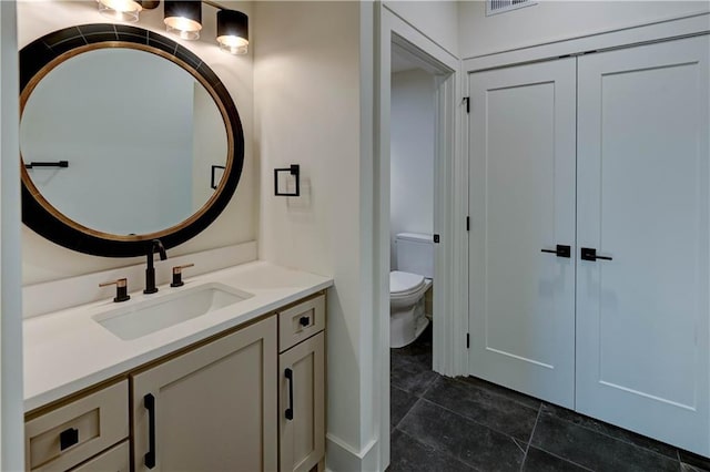 2207 W 71st St, Prairie Village, KS 66208 - bathroom with vanity and toilet