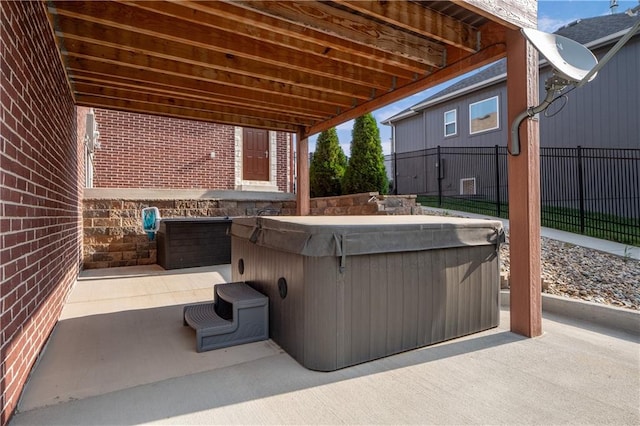 view of patio with a hot tub