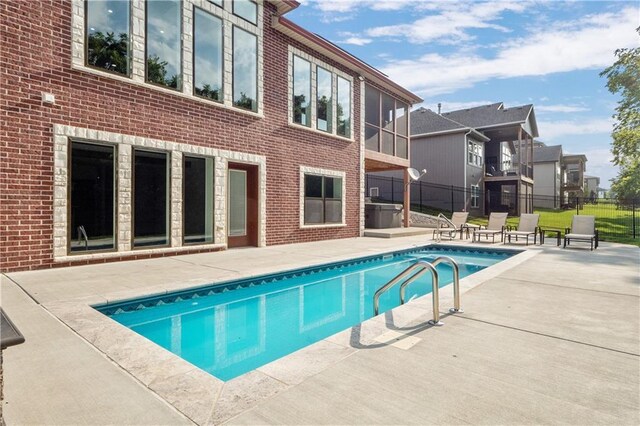 view of pool with a patio area