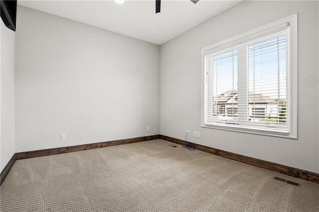 view of carpeted spare room