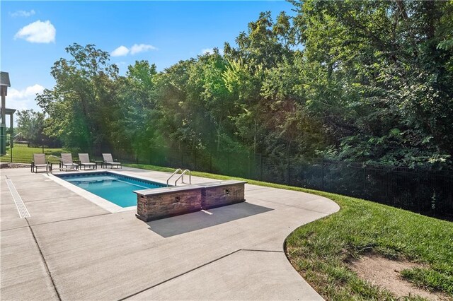 view of pool featuring a patio area