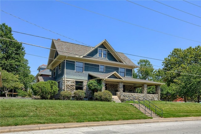 view of front of property with a front lawn