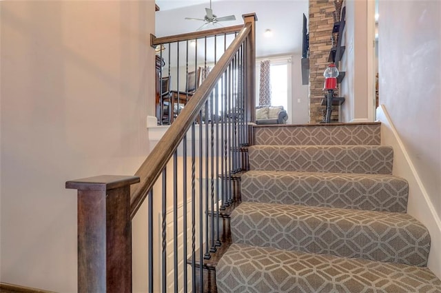 staircase with ceiling fan