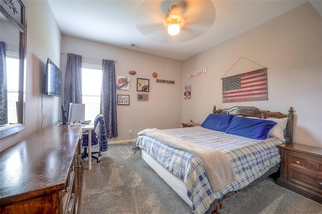 carpeted bedroom with ceiling fan