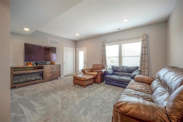 living room featuring light colored carpet