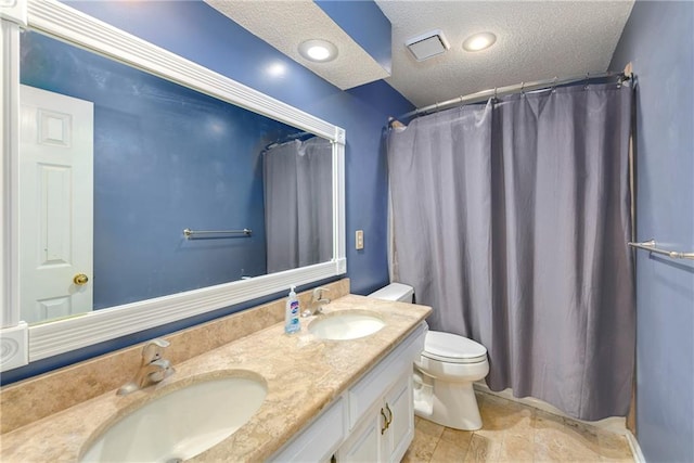 bathroom featuring toilet, a textured ceiling, vanity, and a shower with shower curtain