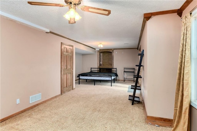 game room with light carpet, a textured ceiling, and ceiling fan