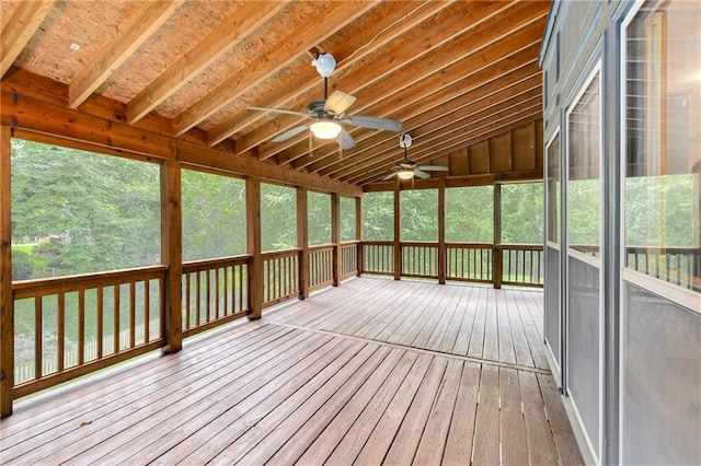 unfurnished sunroom featuring vaulted ceiling and ceiling fan