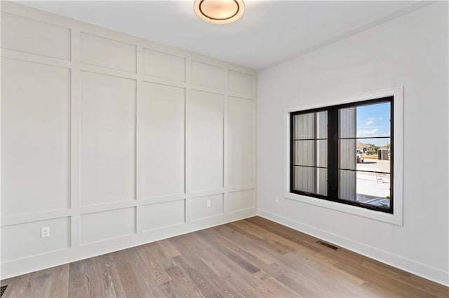 empty room featuring light hardwood / wood-style floors