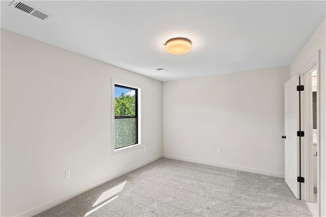 empty room with light carpet