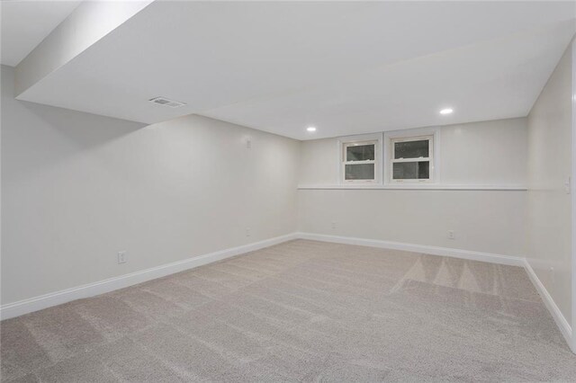 unfurnished room with carpet flooring