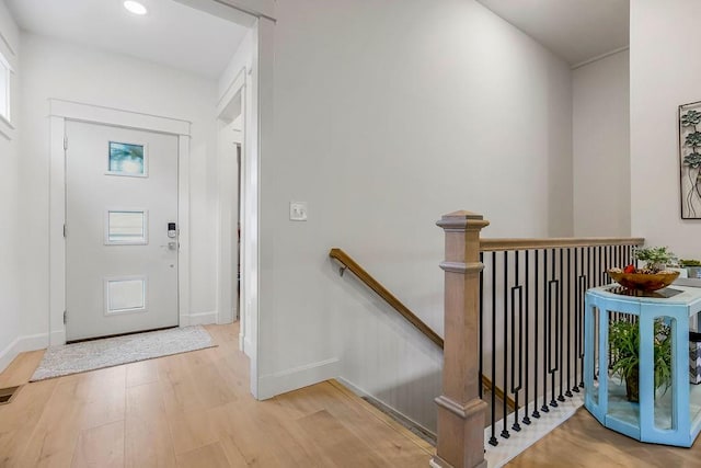 entrance foyer with light hardwood / wood-style floors