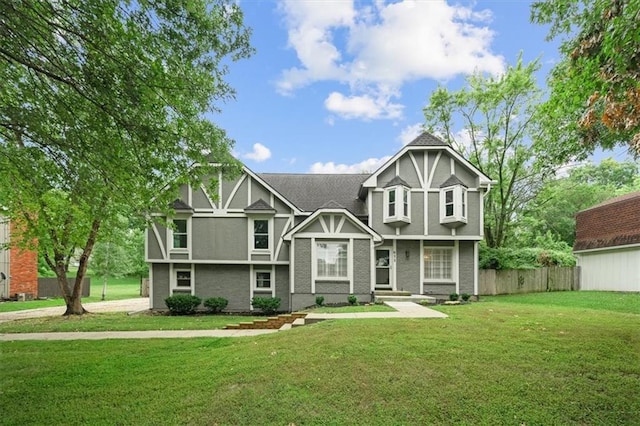 tudor house with a front yard