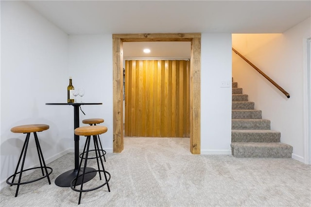 hallway with carpet flooring