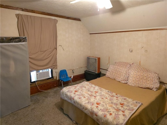 carpeted bedroom featuring a ceiling fan, lofted ceiling, cooling unit, and a textured ceiling