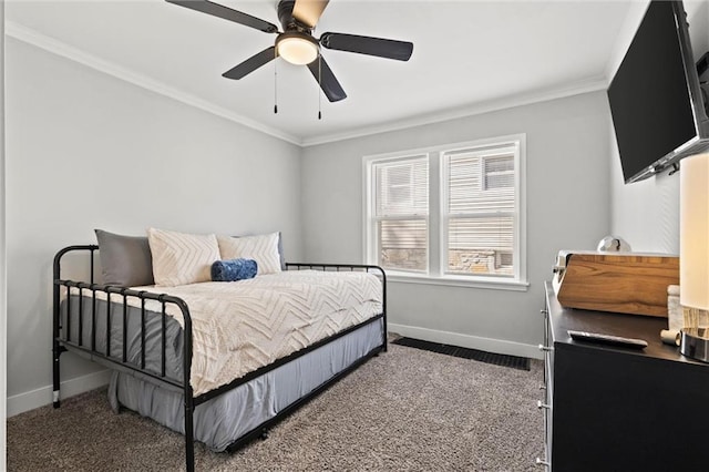 bedroom featuring ornamental molding, ceiling fan, and carpet floors