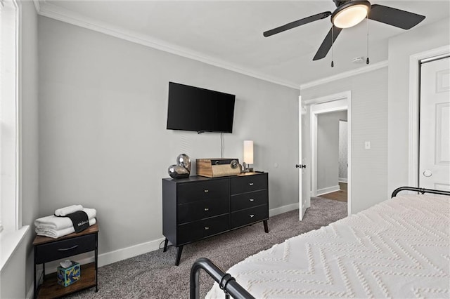 bedroom with carpet floors, crown molding, and ceiling fan