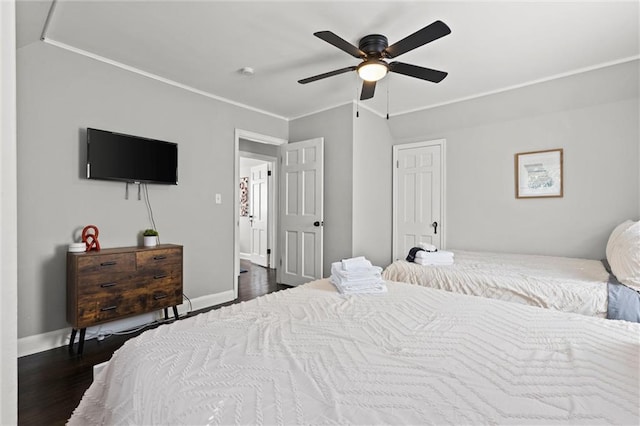 bedroom featuring ceiling fan and dark wood-type flooring