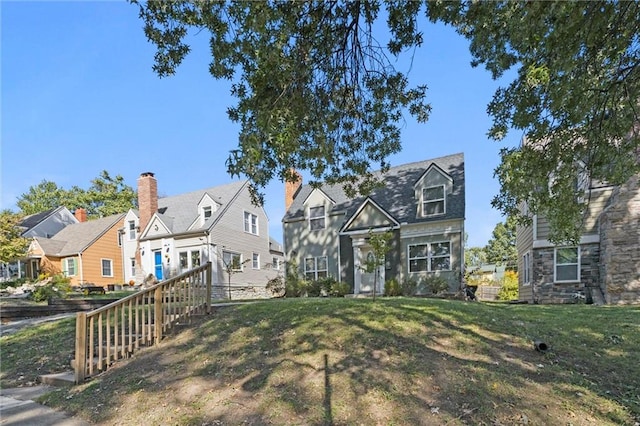 view of front of home with a front lawn