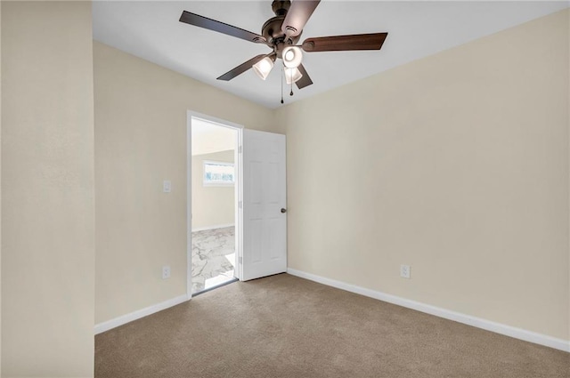 empty room with light carpet and ceiling fan