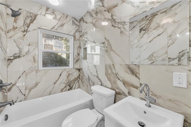 full bathroom with tiled shower / bath, toilet, sink, and tile walls