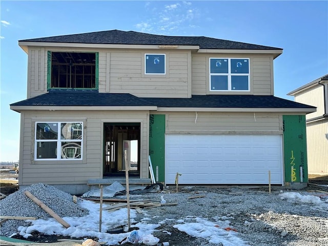 view of front of property featuring a garage