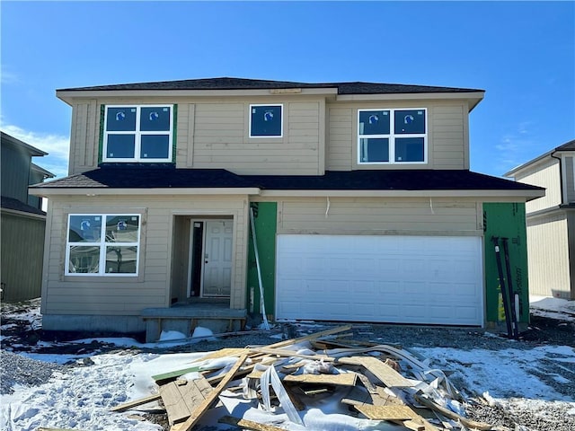 view of front of home featuring an attached garage