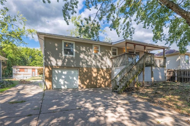 view of front of home with a garage