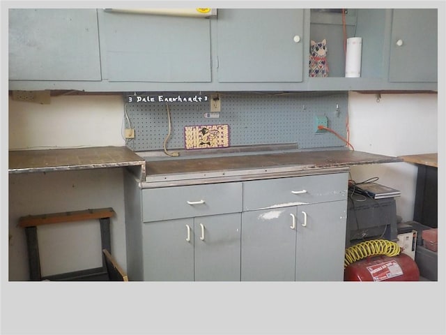 kitchen featuring gray cabinetry and decorative backsplash