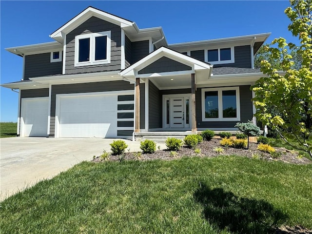 craftsman inspired home featuring a front lawn and a garage