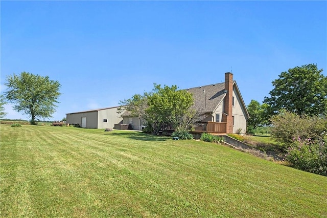 view of yard with a wooden deck