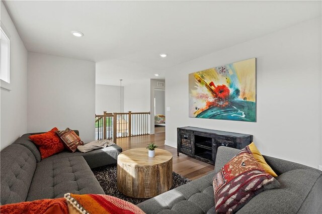 living room with hardwood / wood-style flooring