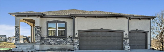 view of front of property featuring a garage