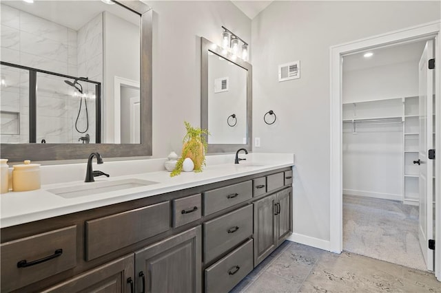 bathroom featuring vanity and walk in shower