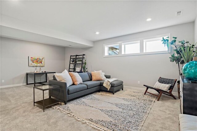 living room featuring light colored carpet