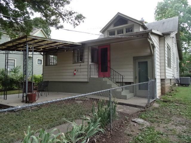 back of property with central AC unit