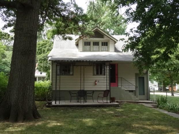 exterior space with a front lawn