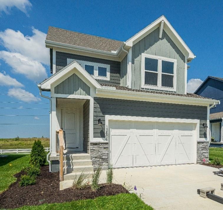 craftsman-style home featuring a garage