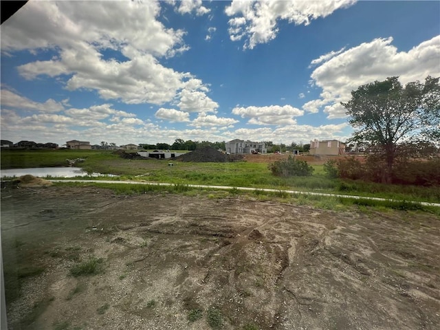 view of yard with a water view