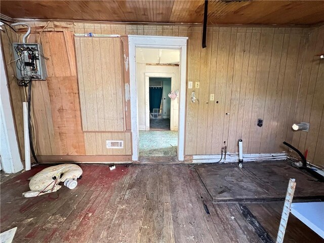 miscellaneous room with wood ceiling, hardwood / wood-style floors, and wood walls