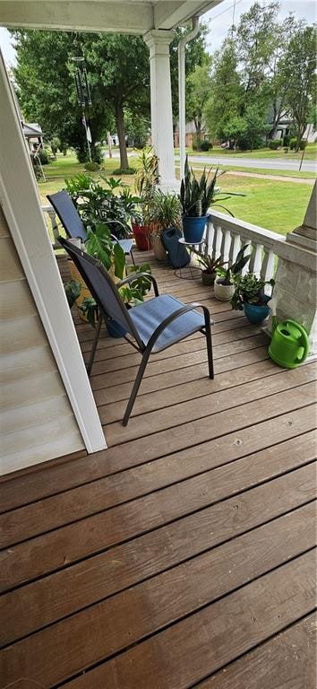 wooden terrace featuring a porch