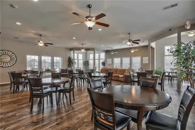 dining room featuring ceiling fan and wood-type flooring