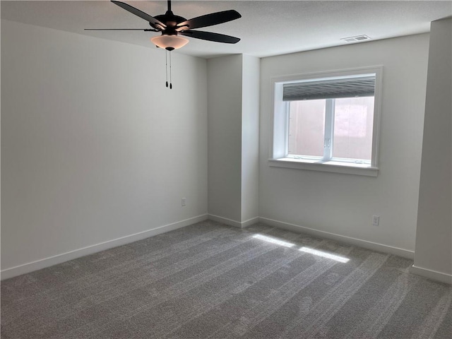 16445 S Elmridge St, Olathe, KS 66062 - empty room featuring carpet flooring, baseboards, a ceiling fan, and visible vents