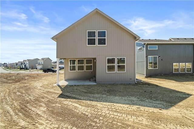 rear view of house with a patio