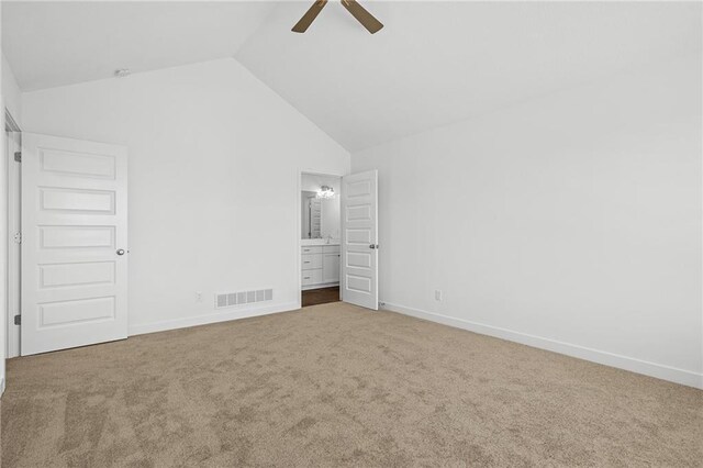 unfurnished bedroom featuring ceiling fan, carpet flooring, and high vaulted ceiling