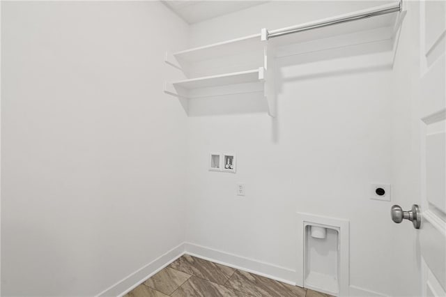 laundry area with hookup for an electric dryer, washer hookup, and tile patterned flooring